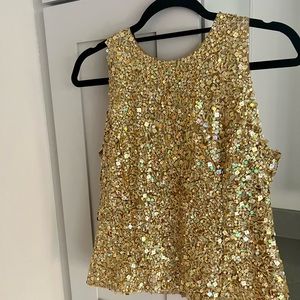 Flattering gold sequins top in perfect condition.